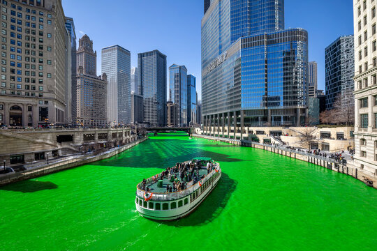 CHICAGO, IL/USA - MARCH 12, 2022: The Chicago River is dyed green annually in celebration of St. Patrick’s Day in downtown Chicago.