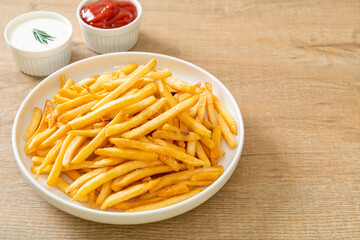 French fries with sour cream and ketchup