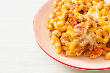 homemade macaroni bolognese with cheese