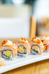 salmon roll sushi with cheese on top