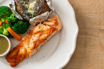 grilled salmon steak with bake potato