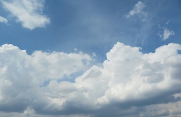 Fototapeta na wymiar Blue sky with big white clouds, natural background