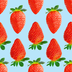 Fresh strawberry seamless pattern. Ripe strawberries isolated on blue. Package design background. Falling strawberry selective focus.