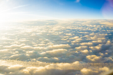 Fototapeta na wymiar Fluffy cloud with blue sky aerial view from airplane