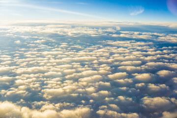 Fluffy cloud with blue sky aerial view from airplane