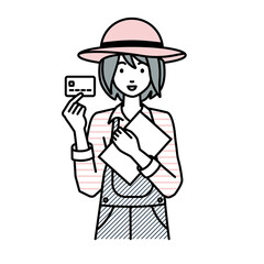 立って書類とカードを手に持つ農家の女性