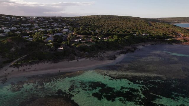 Aerial of people swimming in Australian coastal town Yallingup beach in lagoon