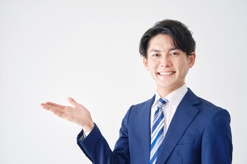 ビジネスマン　案内　白背景
