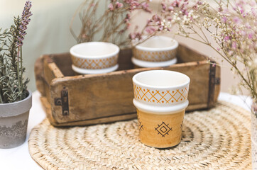 Teacup with flowers. Vintage traditional cups and pink flowers.Fresh morning concept.