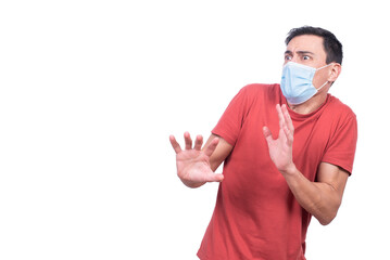 Scared man in protective mask during coronavirus pandemic
