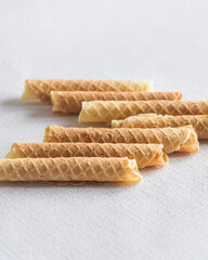 Homemade wafer rolls. Thin and Crispy Waffle. Selective focus.