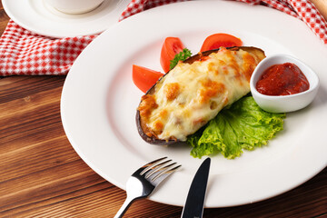 Big mussel baked with cheese on white plate