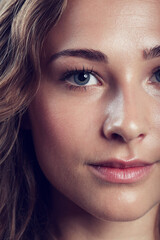 Fototapeta premium Flawless femininity. Portrait of a beautiful young woman in studio.