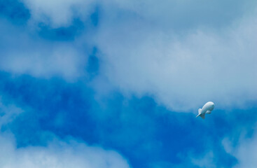 Airship in the blue sky.