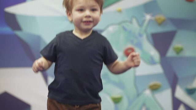 Child on trampolines in an amusement park