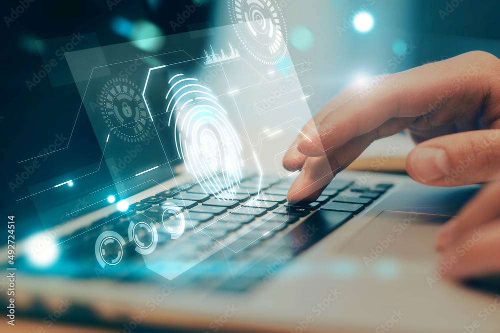 Aufkleber Close up of hands using laptop keyboard with abstract glowing fingerprint interface on blurry background. Login and authorization concept. Double exposure.
