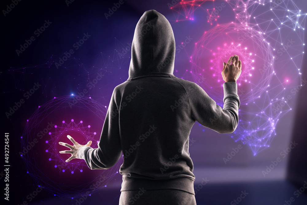 Poster Back view of hacker using abstract polygonal circles interface on blurry purple background. Metaverse and future concept.