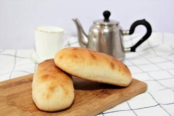 Patties on a wooden board. Sweet pastry. Fast food. Snack.