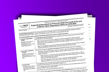 Obraz premium Form 14815 documentation published IRS USA 43681. American tax document on colored