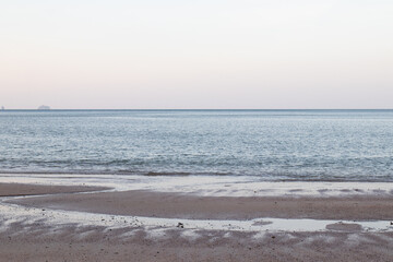 Fototapeta na wymiar Peaceful moment at by the beach