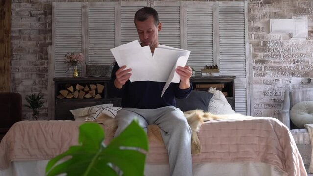 Sad shock job lost man worry upset tired read office bad news cruel mail reduce staff by unfair play off break cancel stop work at home. Labor workforce crisis