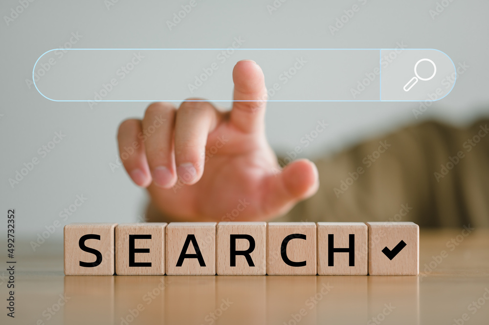 Fototapete Data Search Technology Search Engine Optimization. man's hands touching virtual screen search bar to Searching for information. Using Search Console with your website.