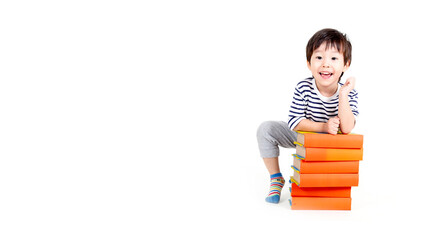 little boy wearing glasses with books on white background, education concept.