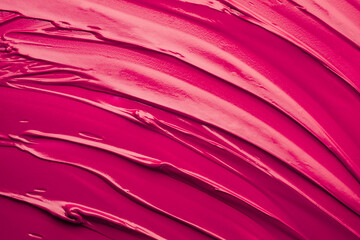 Lip gloss pink colored smudge background texture