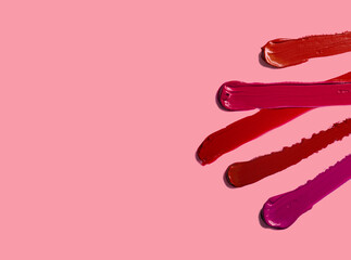 Lipstick balm lip gloss vinous red claret burgundy swatch isolated on white background - obrazy, fototapety, plakaty
