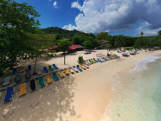 a tropical island with a snow-white beach and a turquoise sea in the Dominican Republic filmed from a drone 