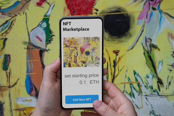 Concept of creation of a digital art object. Create of a Non Fungible Token for sale on the NFT marketplace