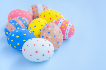 Colorful easter eggs on blue background