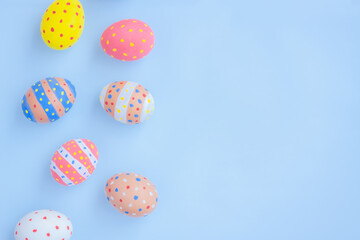 Colorful easter eggs on blue background