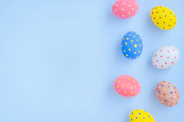 Colorful easter eggs on blue background