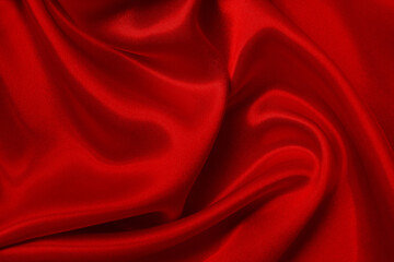 Dark red fabric texture background, detail of silk or linen pattern.
