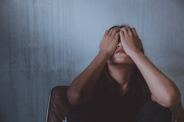 sad woman sit alone feeling bad.