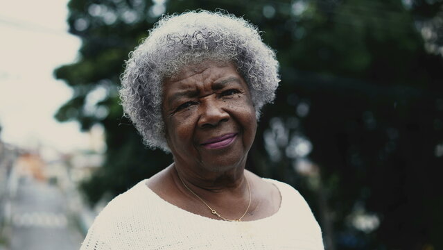 Portrait Of A Brazilian Senior Woman In 80s Standing Outside