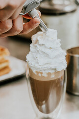 Whipped cream on Coffee Latte and Waffles 