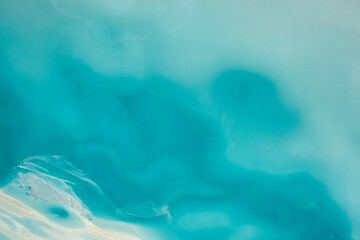 Fototapeta na wymiar Blue ice abstract textured background