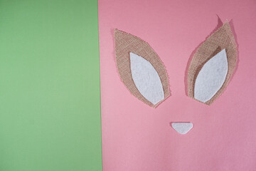 Happy Easter card. Easter Bunny pink background. Holiday concept.