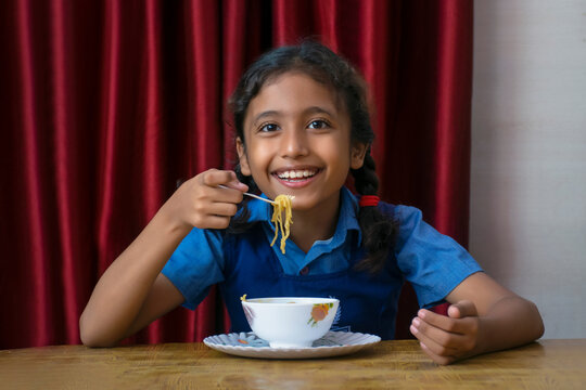 Girl Eating Instant Noodles