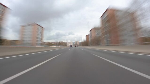 driving a car on the barcelona motorway highway in spain, fast camera mounted on the front c32 ronda de dalt