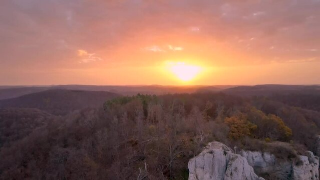Aerial view of sunrise over panoramic rock and forest in Swabian Alb, Germany