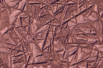 Beautiful colorful, bright and vivid chocolate background or texture of mud, slush or muck with ice in cold and frost winter weather