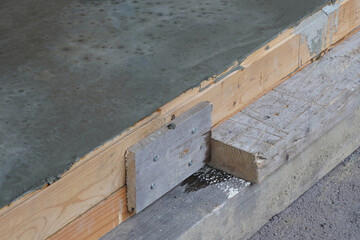 Concrete in Self made Wooden formwork.