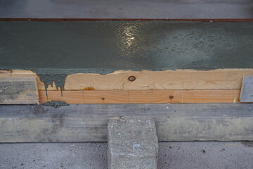 Concrete in Self made Wooden formwork.