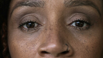Naklejka premium Person macro eyes close-up staring at camera