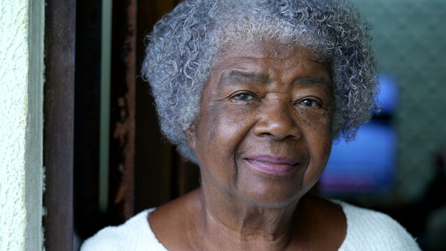Portrait of a senior black woman face close-up looking at camera