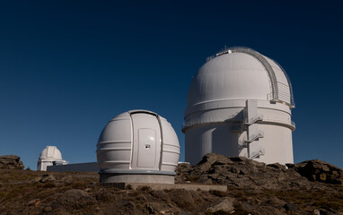 Observatories against blue sky. Almeria, Spain