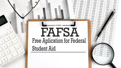 FAFSA. Free application for federal student aid. A text on clipboard on chart